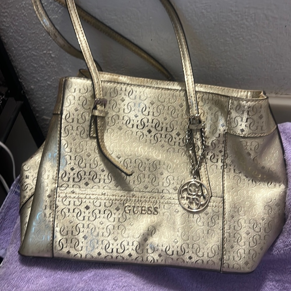 Gold guess holiday bag